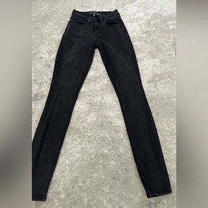 Black dkny mid waste skinny jeans.